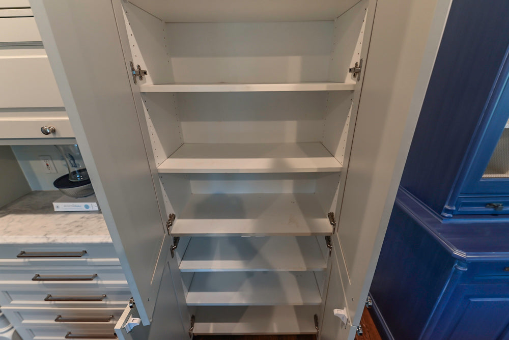 Traditional White Kitchen with Blue Island & Appliances