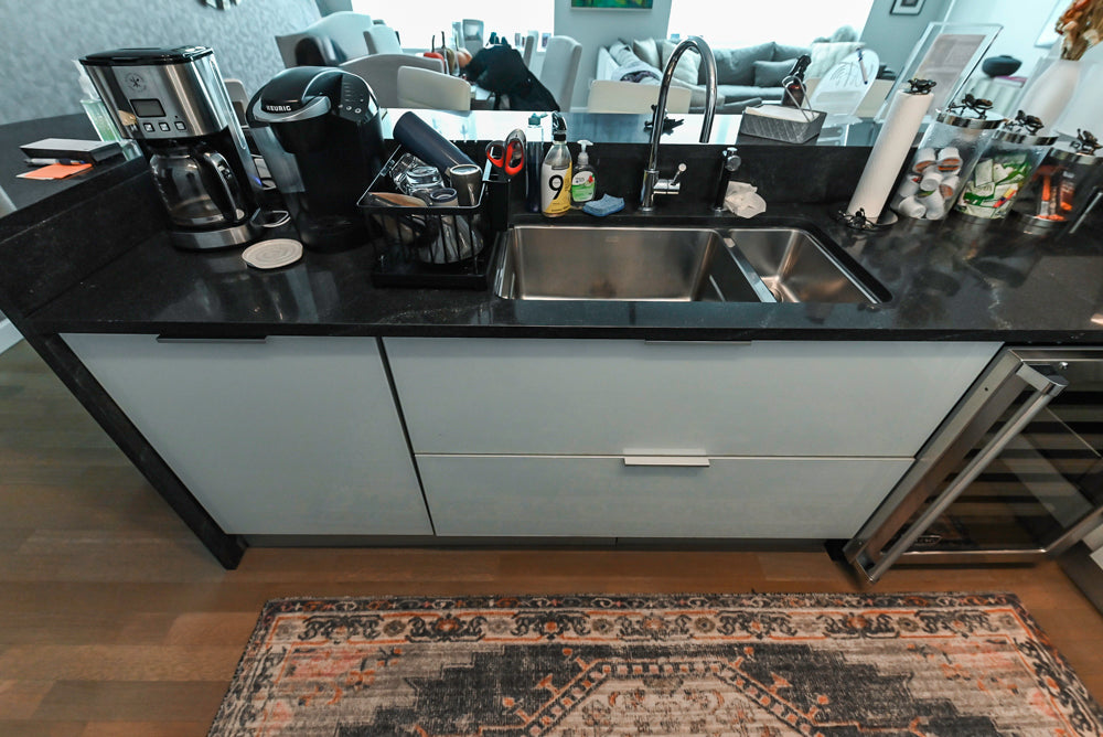 Cesar Modern Glossy White Kitchen with Black Granite Countertops & Appliances