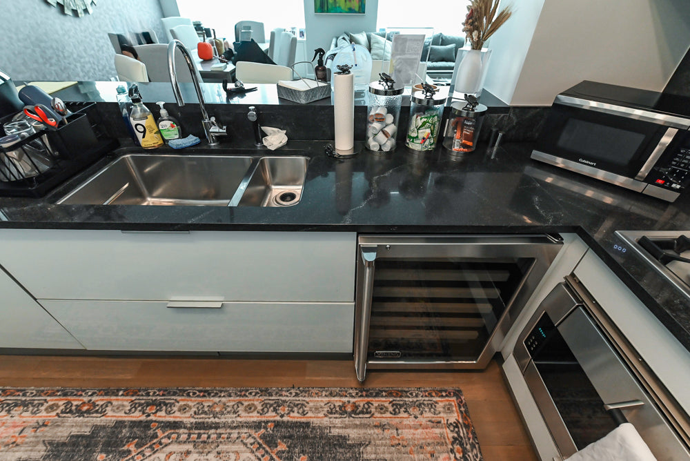 Cesar Modern Glossy White Kitchen with Black Granite Countertops & Appliances