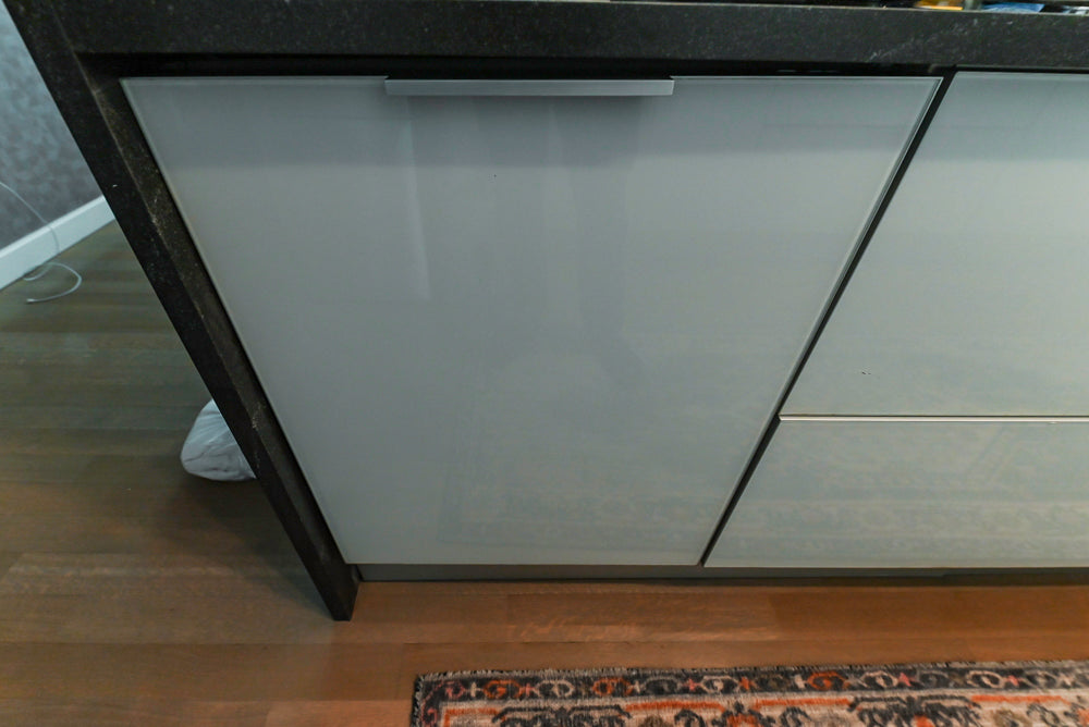 Cesar Modern Glossy White Kitchen with Black Granite Countertops & Appliances