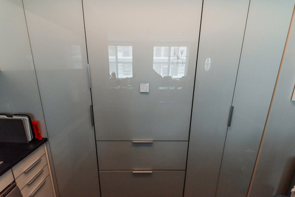 Cesar Modern Glossy White Kitchen with Black Granite Countertops & Appliances