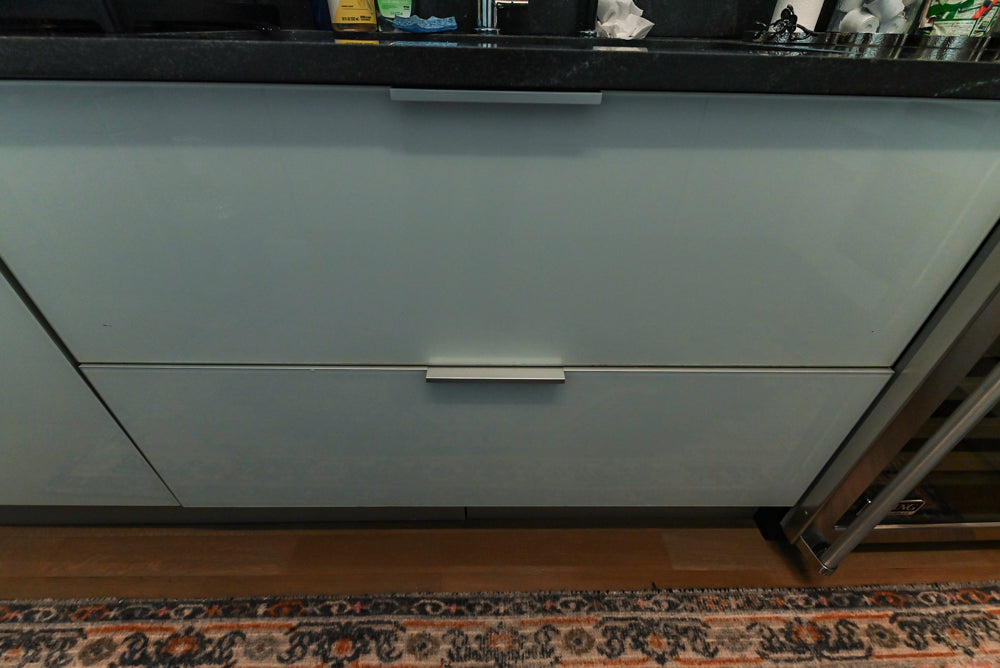 Cesar Modern Glossy White Kitchen with Black Granite Countertops & Appliances