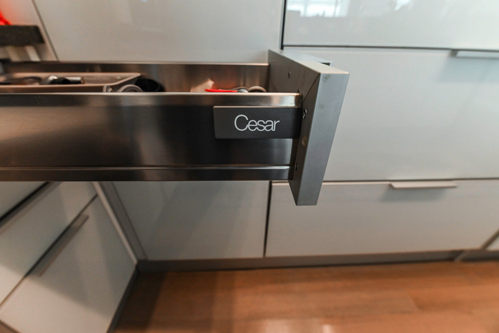 Cesar Modern Glossy White Kitchen with Black Granite Countertops & Appliances