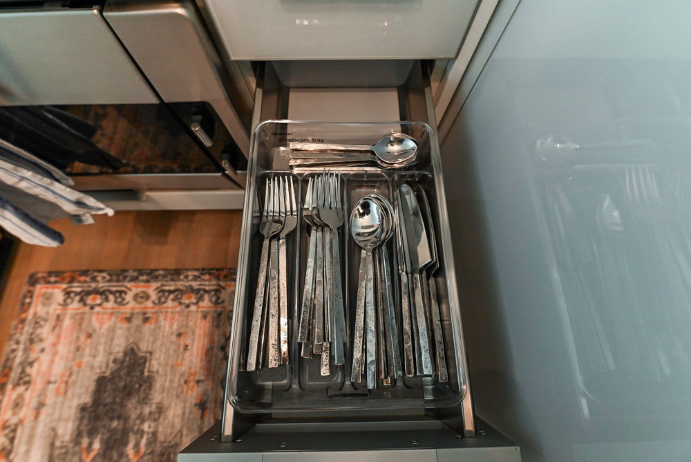 Cesar Modern Glossy White Kitchen with Black Granite Countertops & Appliances