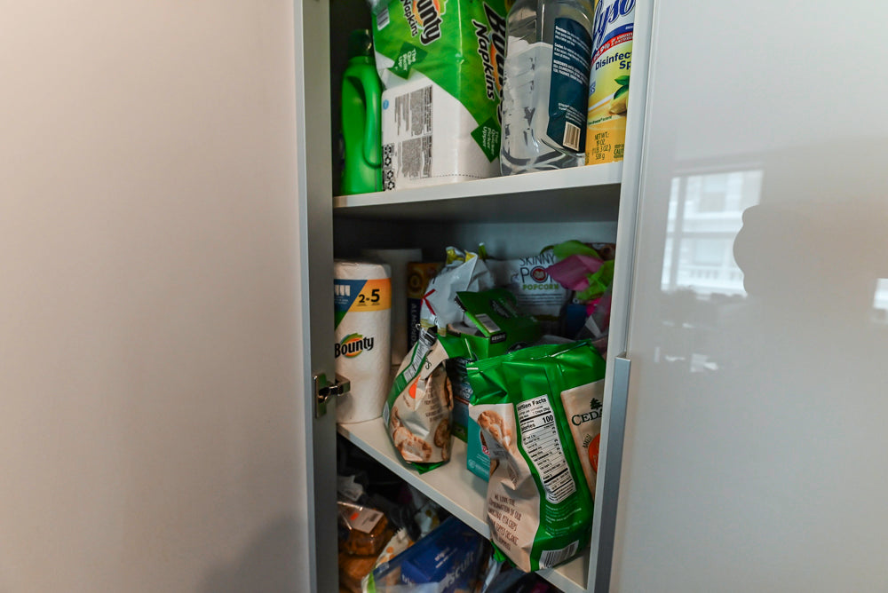 Cesar Modern Glossy White Kitchen with Black Granite Countertops & Appliances