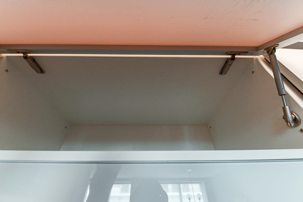 Cesar Modern Glossy White Kitchen with Black Granite Countertops & Appliances