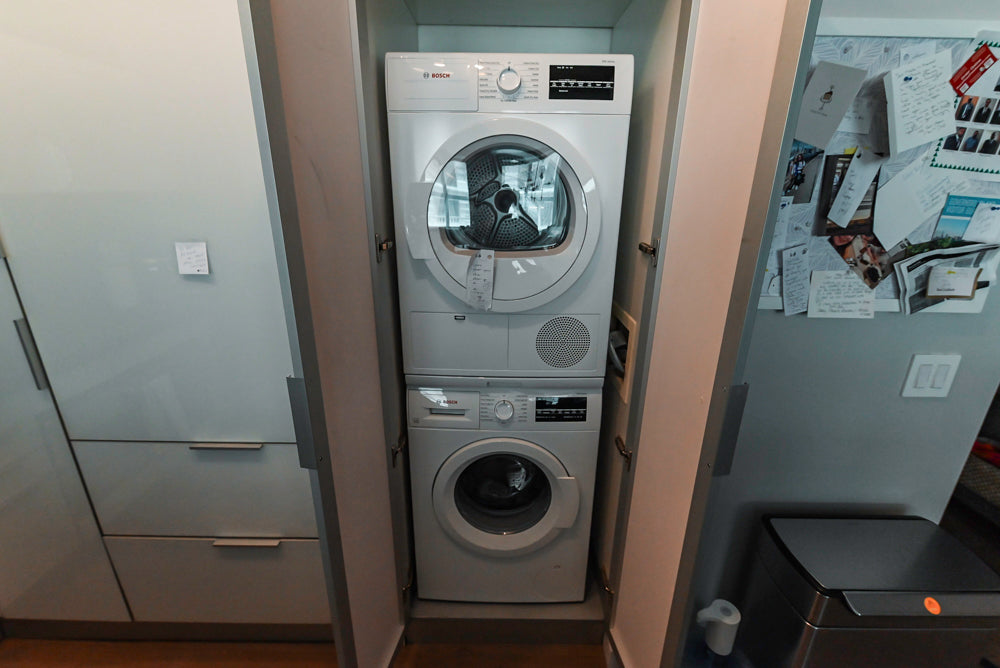 Cesar Modern Glossy White Kitchen with Black Granite Countertops & Appliances