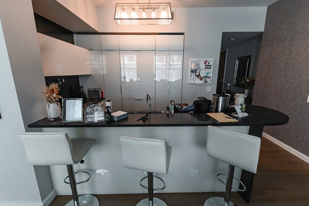 Cesar Modern Glossy White Kitchen with Black Granite Countertops & Appliances