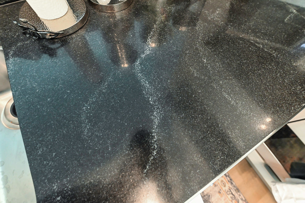 Cesar Modern Glossy White Kitchen with Black Granite Countertops & Appliances