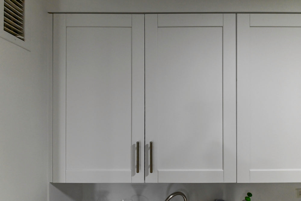 Heritage Transitional White Kitchen with Island and Stainless Steel Appliances