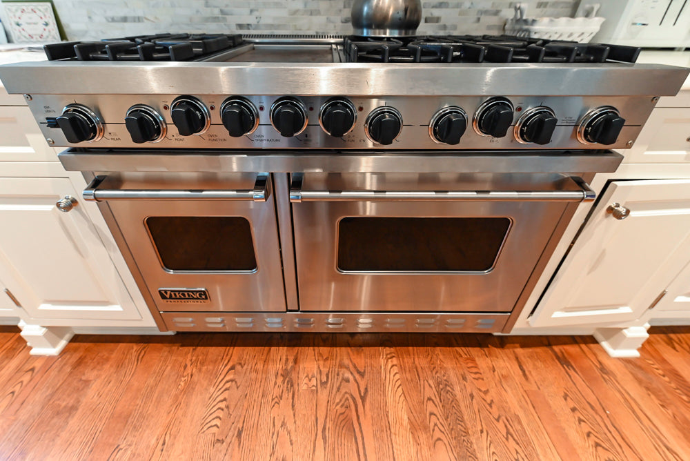 Pristine Premier: Traditional White Kitchen with Marble Island & Appliances