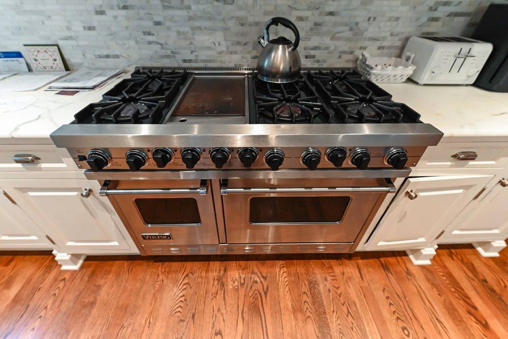 Pristine Premier: Traditional White Kitchen with Marble Island & Appliances