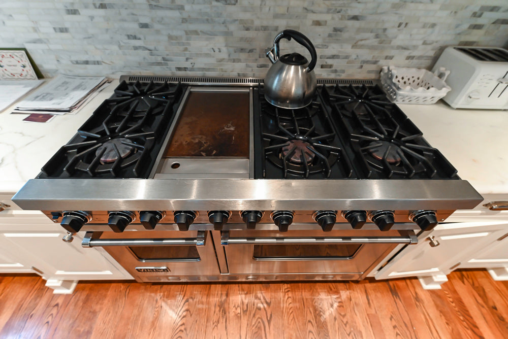 Pristine Premier: Traditional White Kitchen with Marble Island & Appliances
