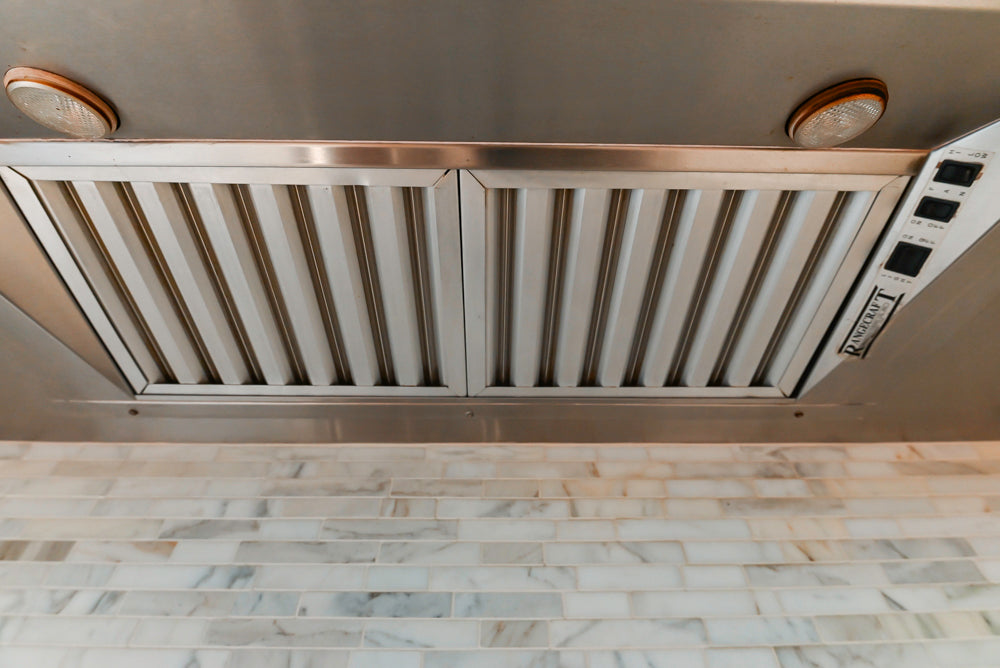 Pristine Premier: Traditional White Kitchen with Marble Island & Appliances