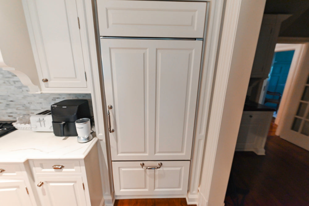 Pristine Premier: Traditional White Kitchen with Marble Island & Appliances