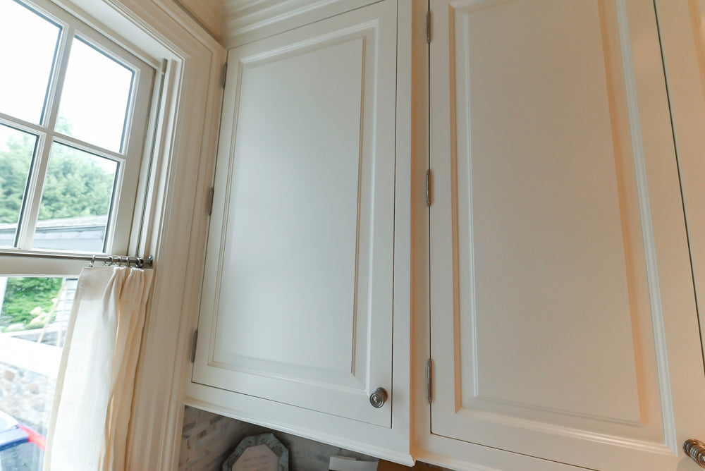 Pristine Premier: Traditional White Kitchen with Marble Island & Appliances