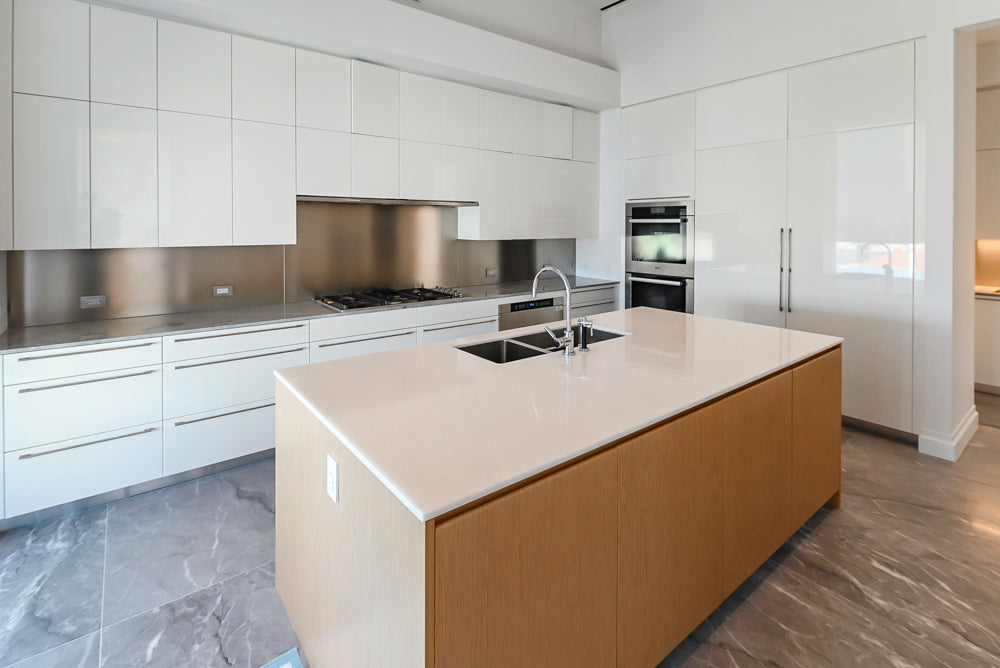Modern Glossy White Kitchen with Island, Marble Countertops & Miele Appliances
