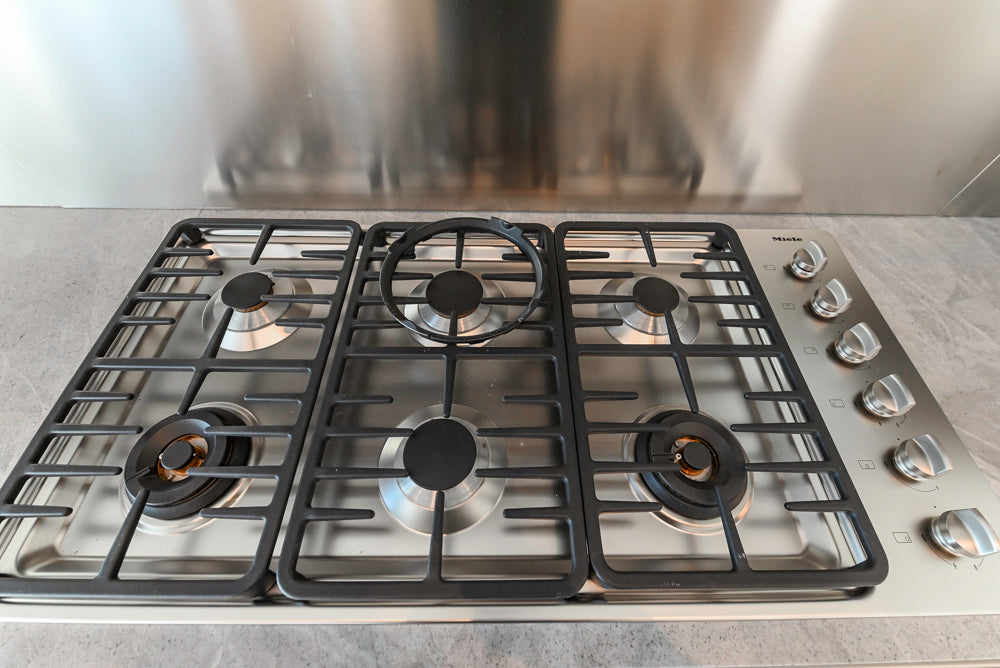 Modern Glossy White Kitchen with Island, Marble Countertops & Miele Appliances