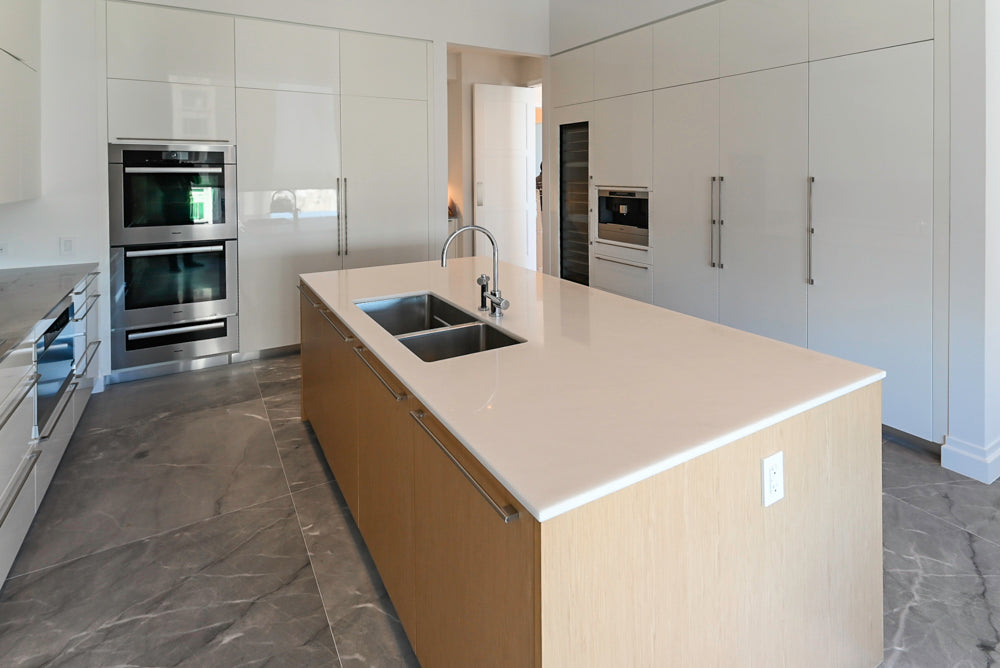 Modern Glossy White Kitchen with Island, Marble Countertops & Miele Appliances