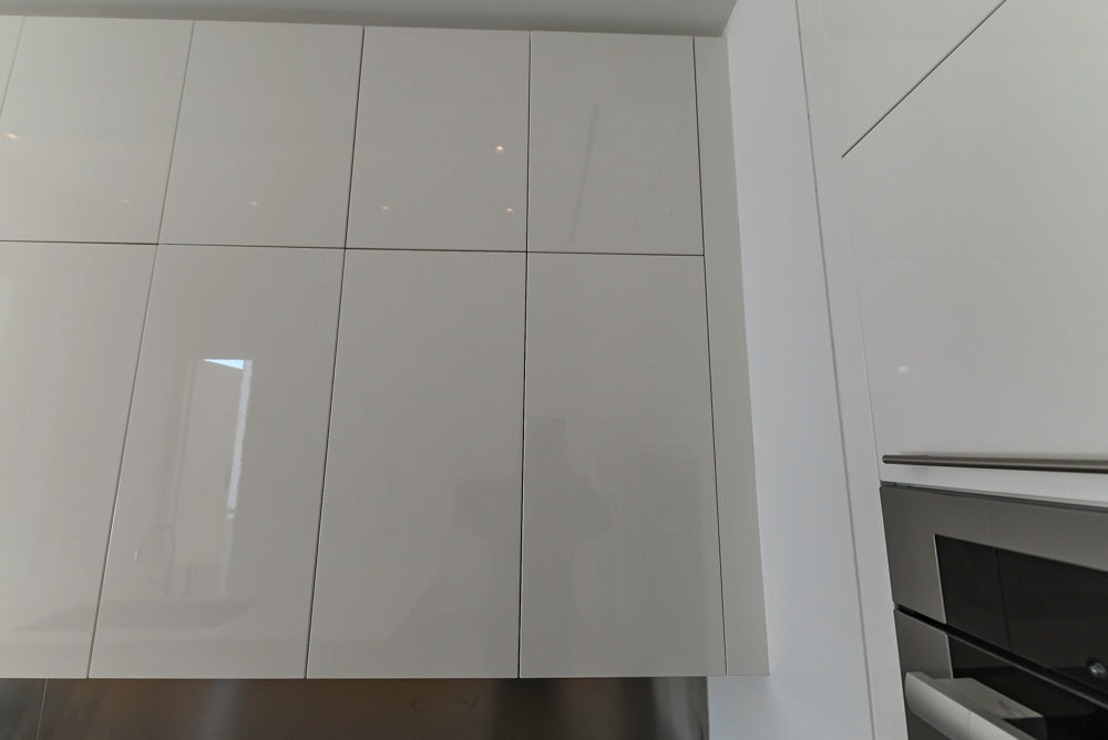 Aran Cucine Modern Glossy White Kitchen with Island, Marble Countertops & Miele Appliances