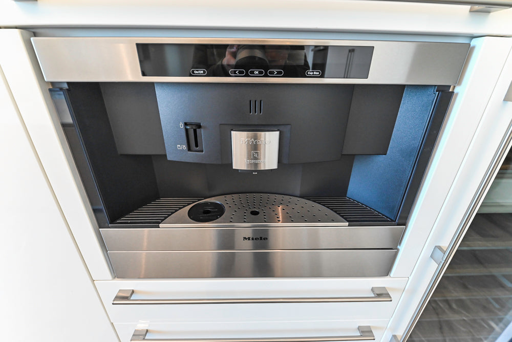 Modern Glossy White Kitchen with Island, Marble Countertops & Miele Appliances