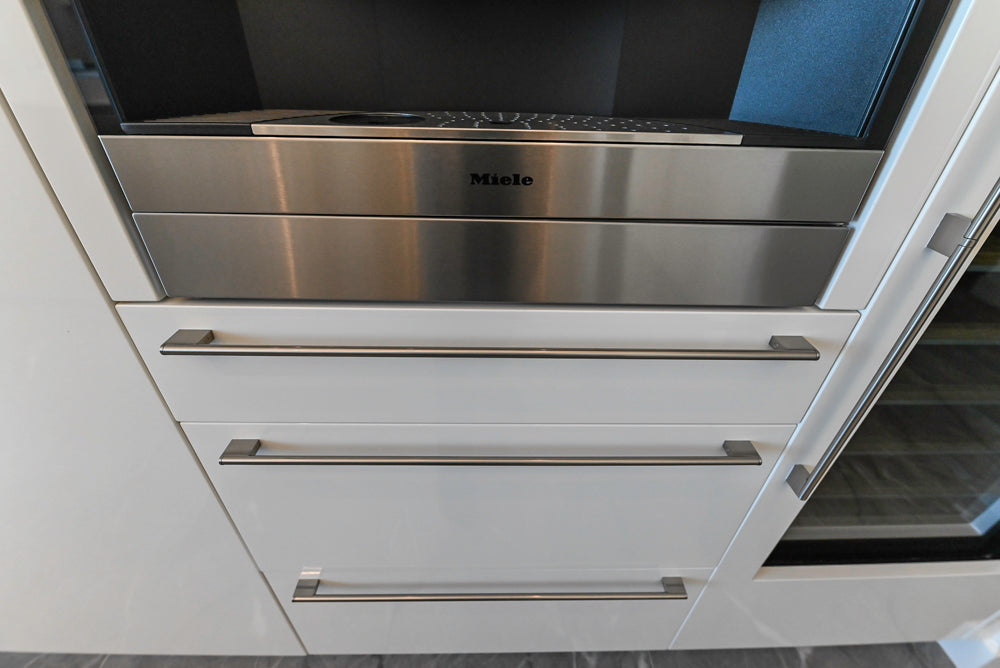 Modern Glossy White Kitchen with Island, Marble Countertops & Miele Appliances