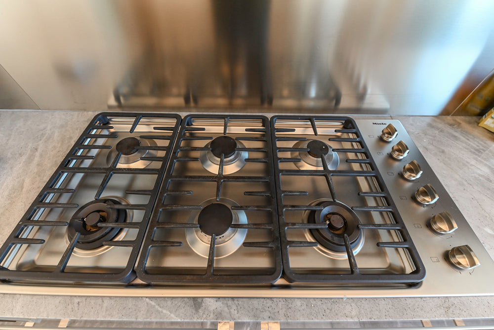 Aran Cucine Modern Glossy White Kitchen with Island, Marble Countertops & Miele Appliances