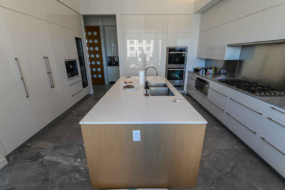 Modern Glossy White Kitchen with Island, Marble Countertops & Miele Appliances