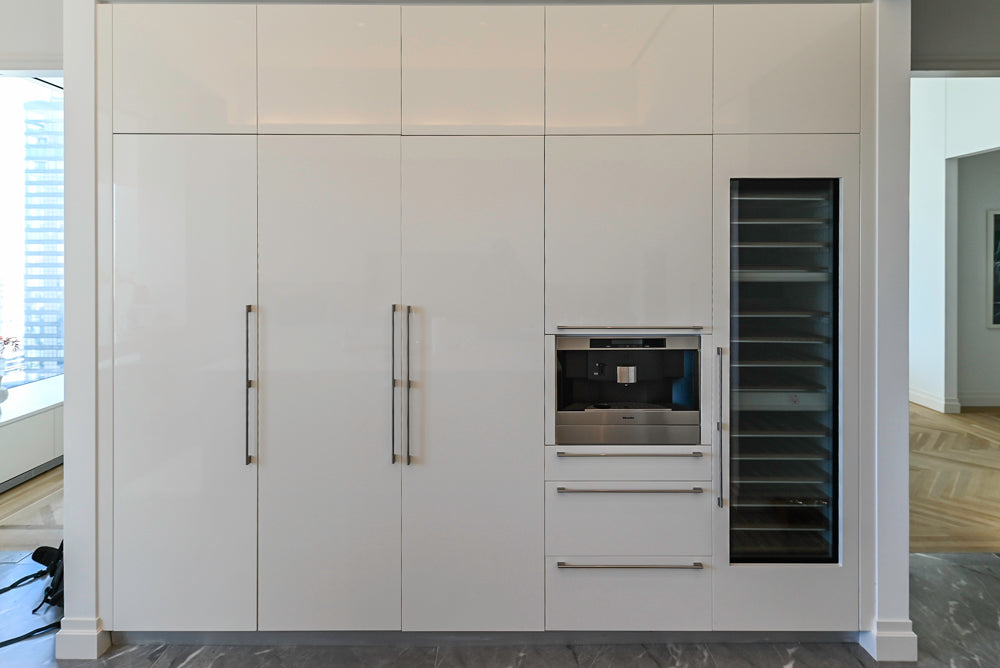 Modern Glossy White Kitchen with Island, Marble Countertops & Miele Appliances