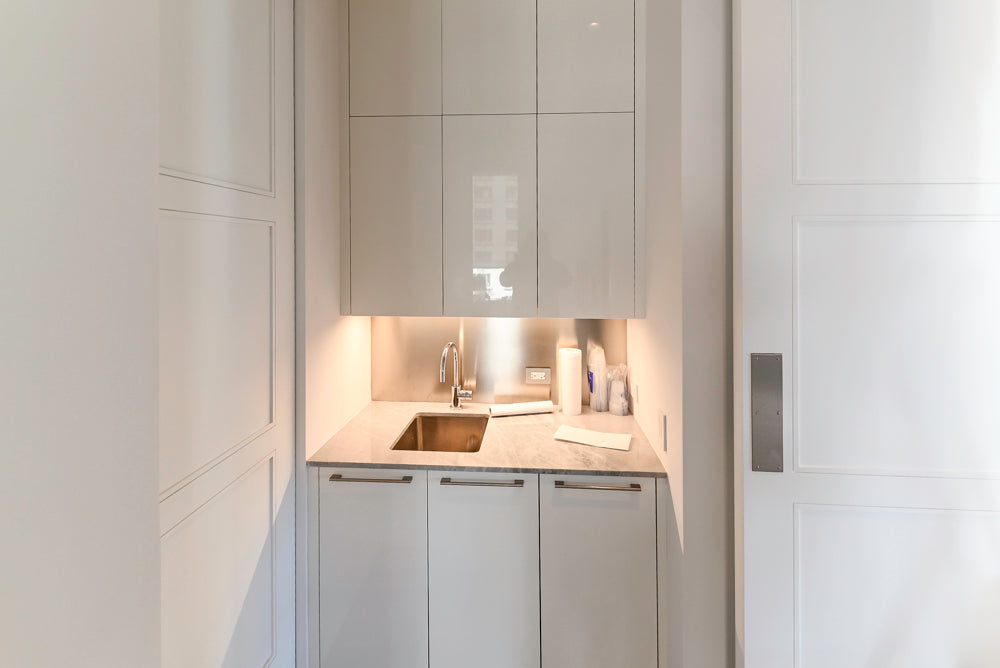 Modern Glossy White Wet Bar with Marble Countertops