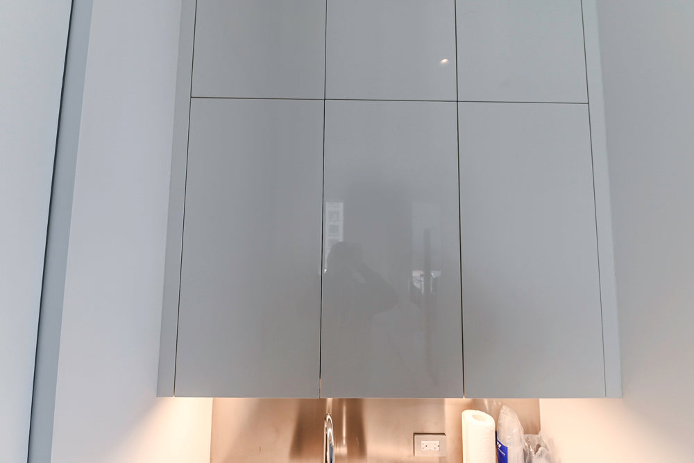 Modern Glossy White Wet Bar with Marble Countertops