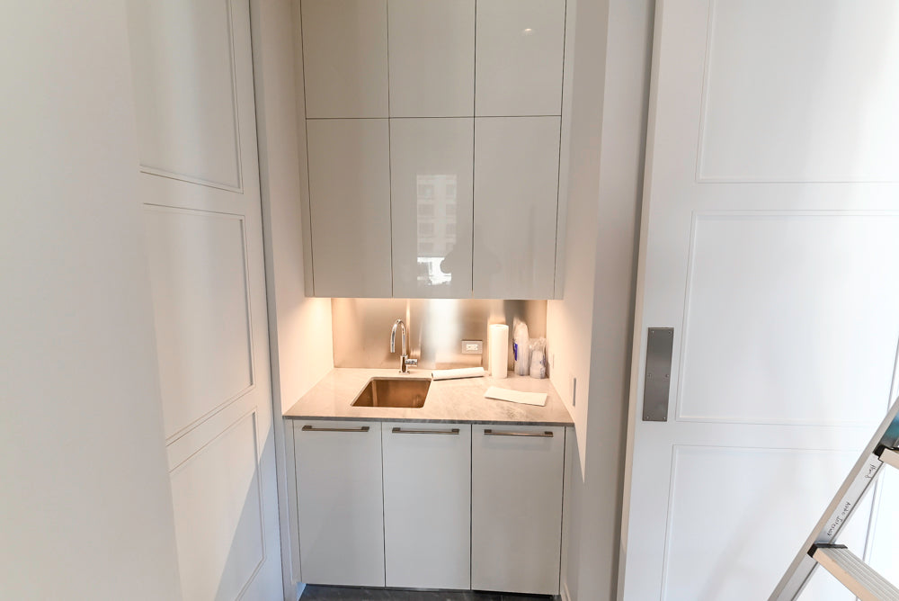 Modern Glossy White Wet Bar with Marble Countertops