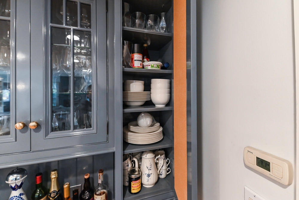 Traditional White Kitchen with Island, Appliances and Marble Countertops