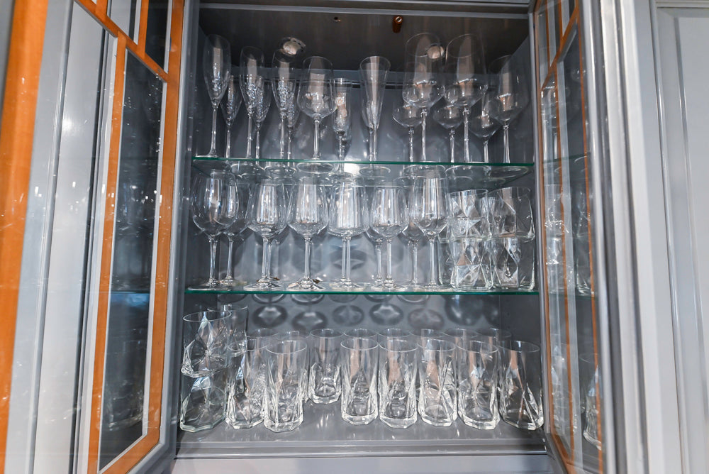 Traditional White Kitchen with Island, Appliances and Marble Countertops