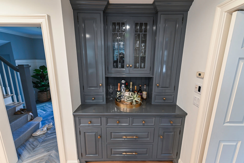 Traditional White Kitchen with Island, Appliances and Marble Countertops