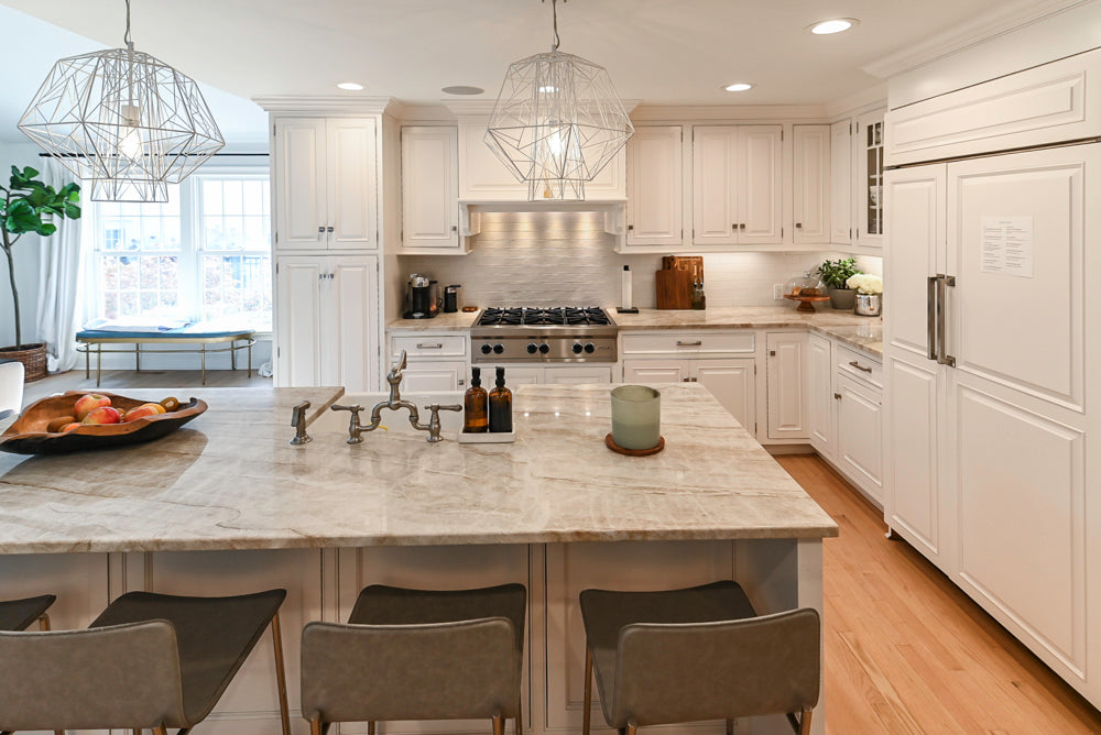 Traditional White Kitchen with Island, Appliances and Marble Countertops