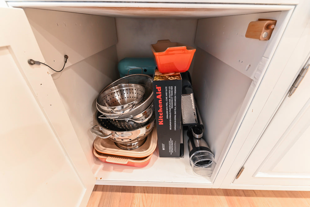 Traditional White Kitchen with Island, Appliances and Marble Countertops