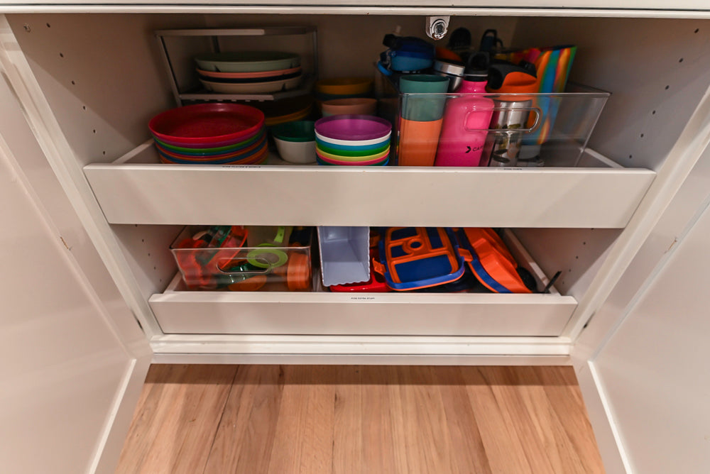 Traditional White Kitchen with Island, Appliances and Marble Countertops