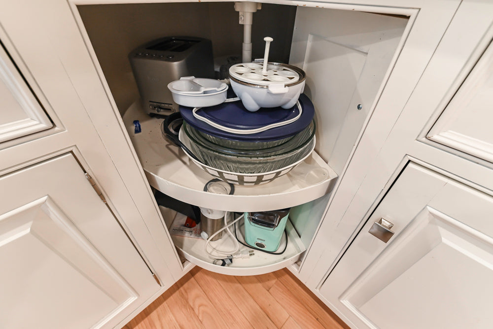 Traditional White Kitchen with Island, Appliances and Marble Countertops
