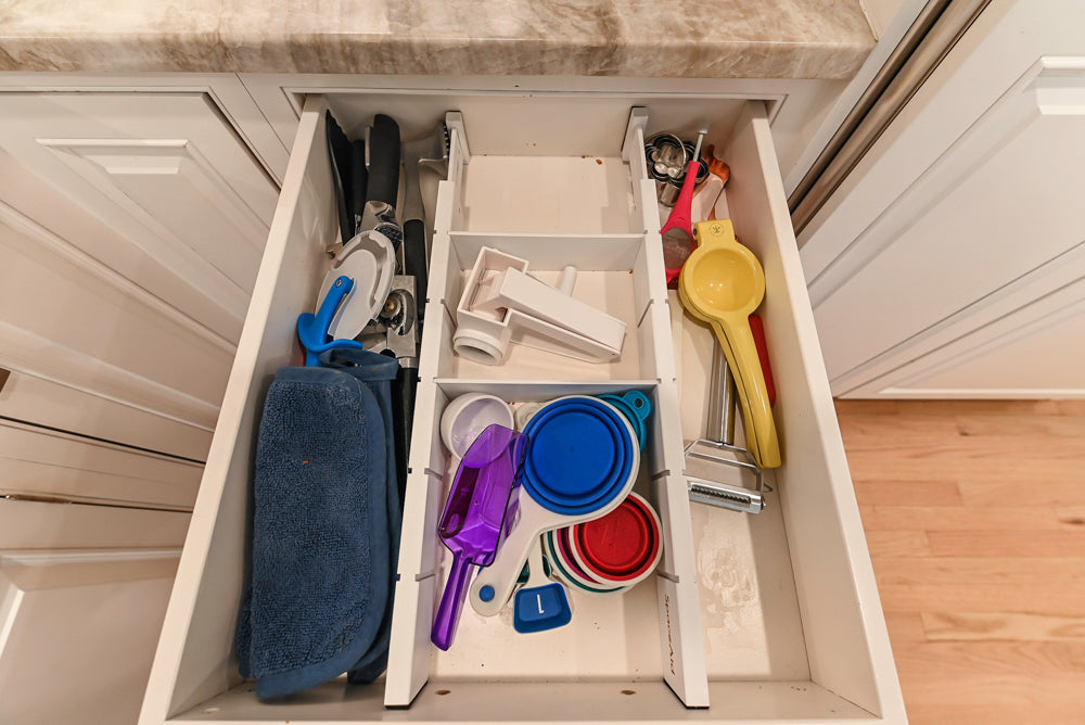 Traditional White Kitchen with Island, Appliances and Marble Countertops