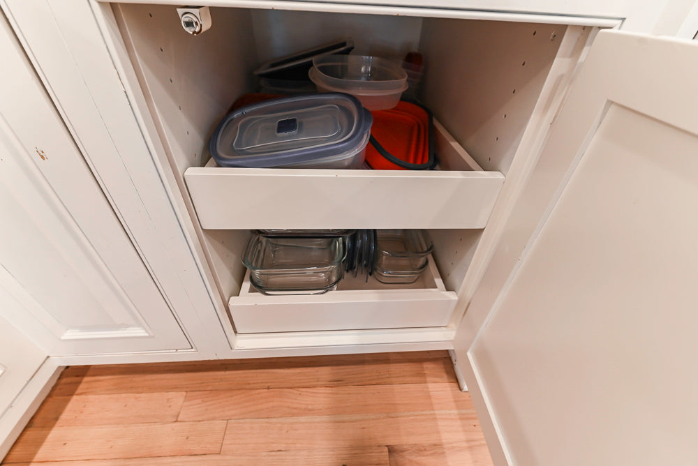 Traditional White Kitchen with Island, Appliances and Marble Countertops