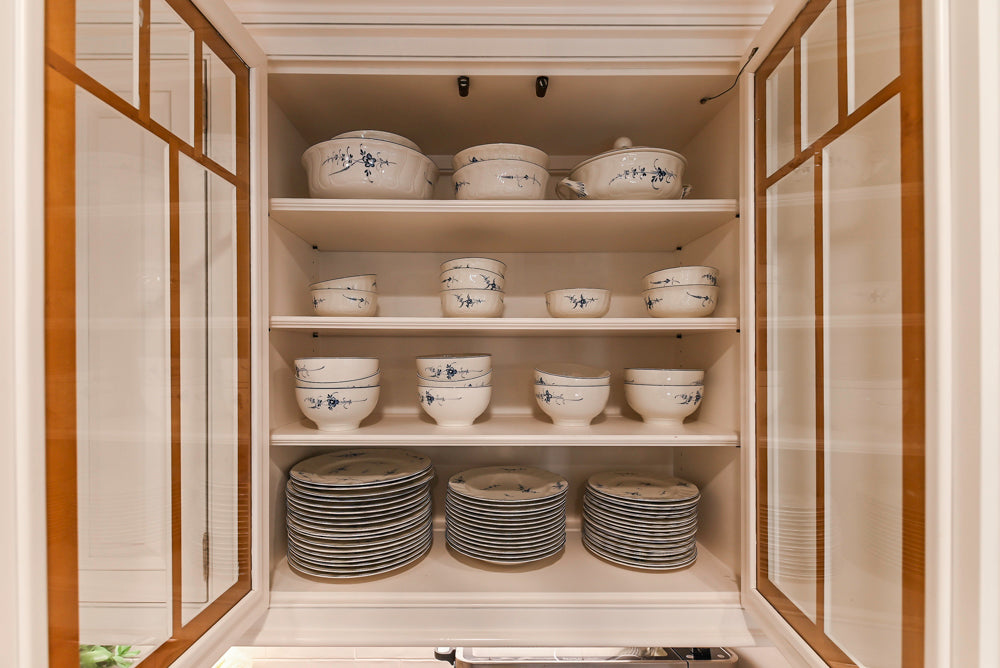 Traditional White Kitchen with Island, Appliances and Marble Countertops