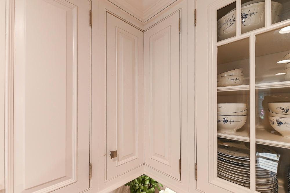 Traditional White Kitchen with Island, Appliances and Marble Countertops