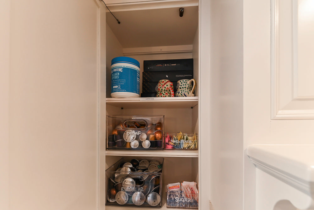 Traditional White Kitchen with Island, Appliances and Marble Countertops