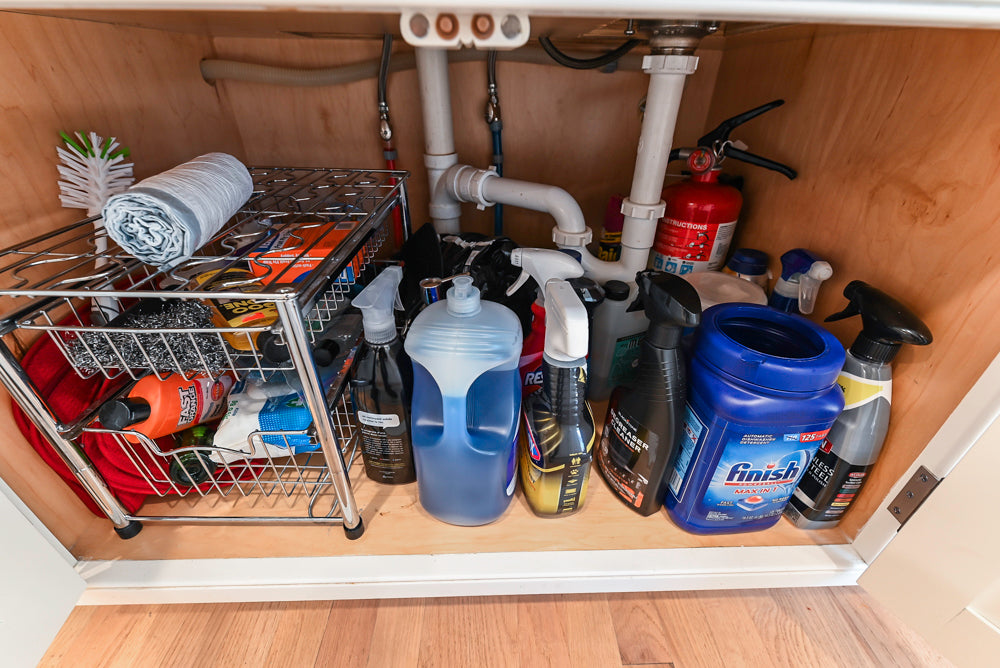 Traditional White Kitchen with Island, Appliances and Marble Countertops