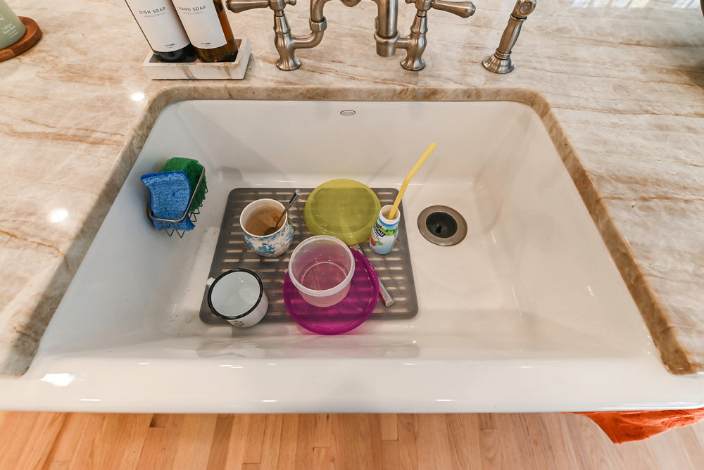 Traditional White Kitchen with Island, Appliances and Marble Countertops
