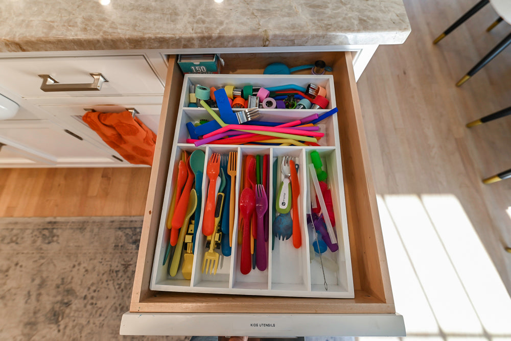 Traditional White Kitchen with Island, Appliances and Marble Countertops