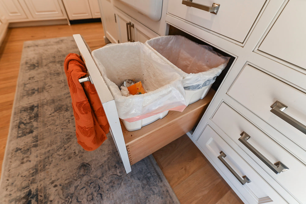 Traditional White Kitchen with Island, Appliances and Marble Countertops