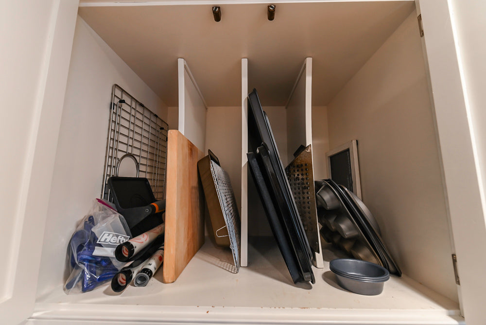 Traditional White Kitchen with Island, Appliances and Marble Countertops