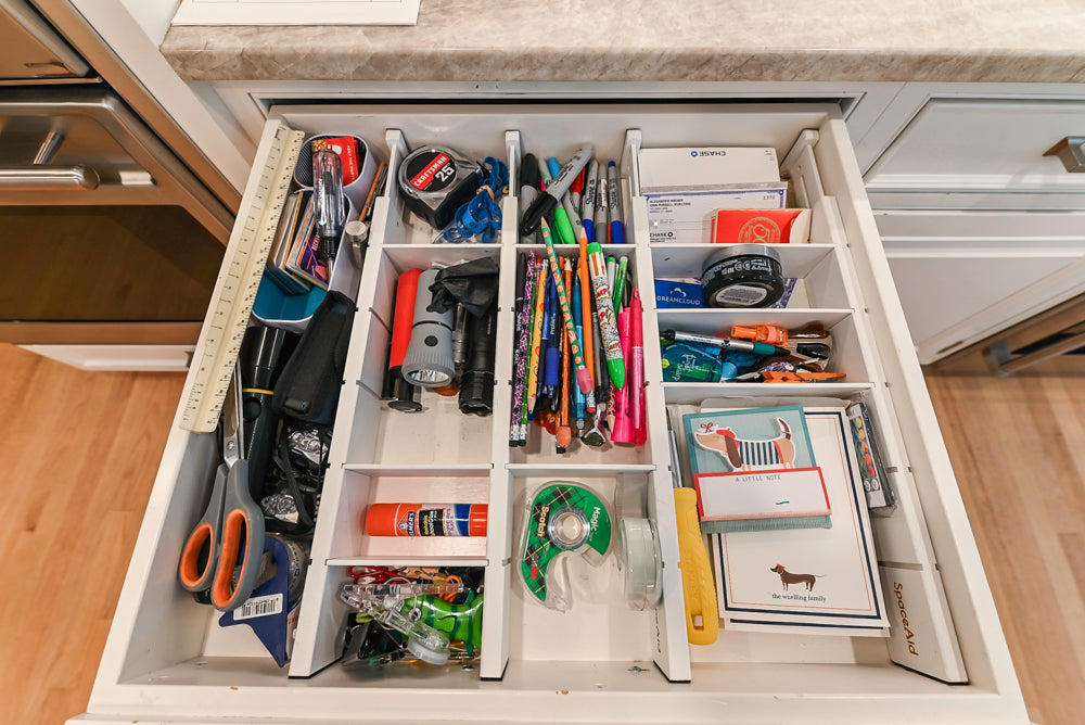 Traditional White Kitchen with Island, Appliances and Marble Countertops